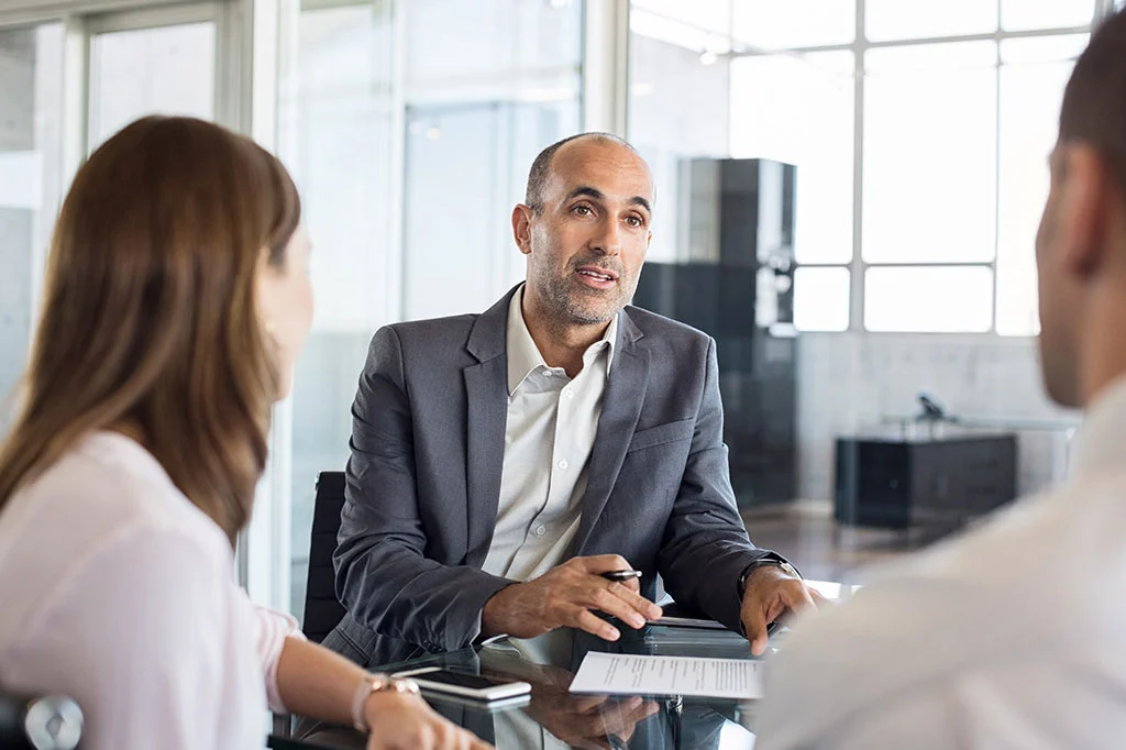 Property manager reviewing NSPIRE compliance documentation across a portfolio