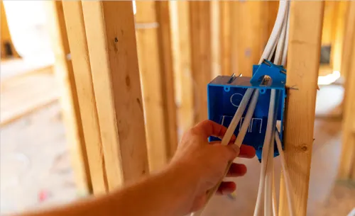 certified electrician installing the outlets and sockets