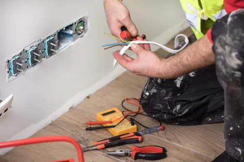 electrical code requirements met after a certified professional is installing the outlets